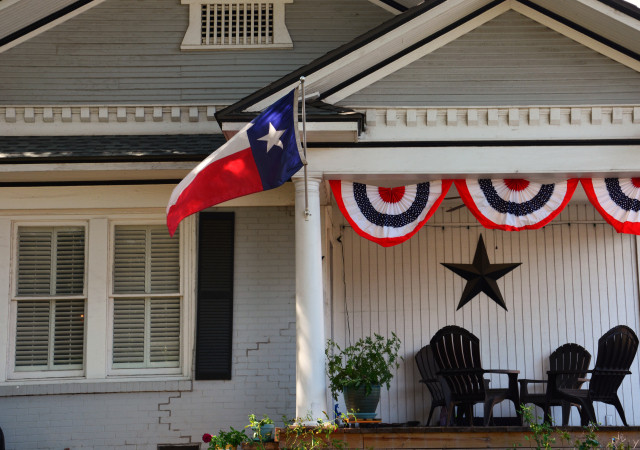 Home with Texas Flag in front